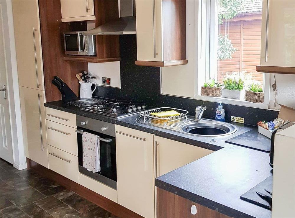 Fully-appointed kitchen at Coniston 5 in Troutbeck Bridge, near Windermere, Cumbria