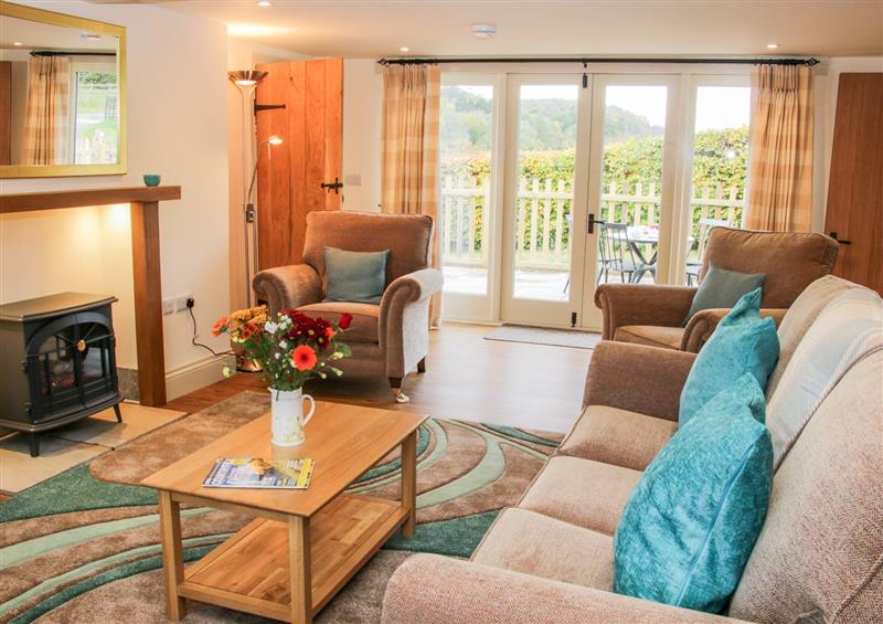 Relax in the living area at Conkers Cottage, Rushbury near Church Stretton