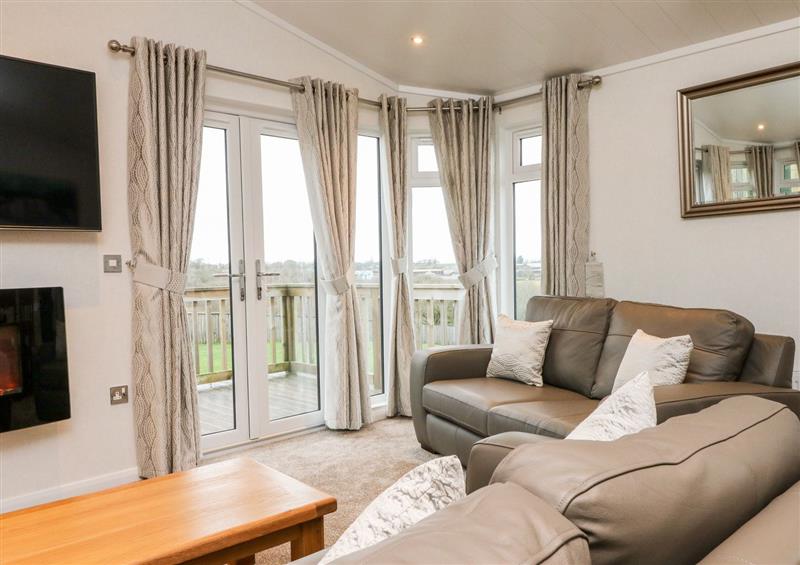 Relax in the living area at Conkers Lodge, Southcott near Okehampton