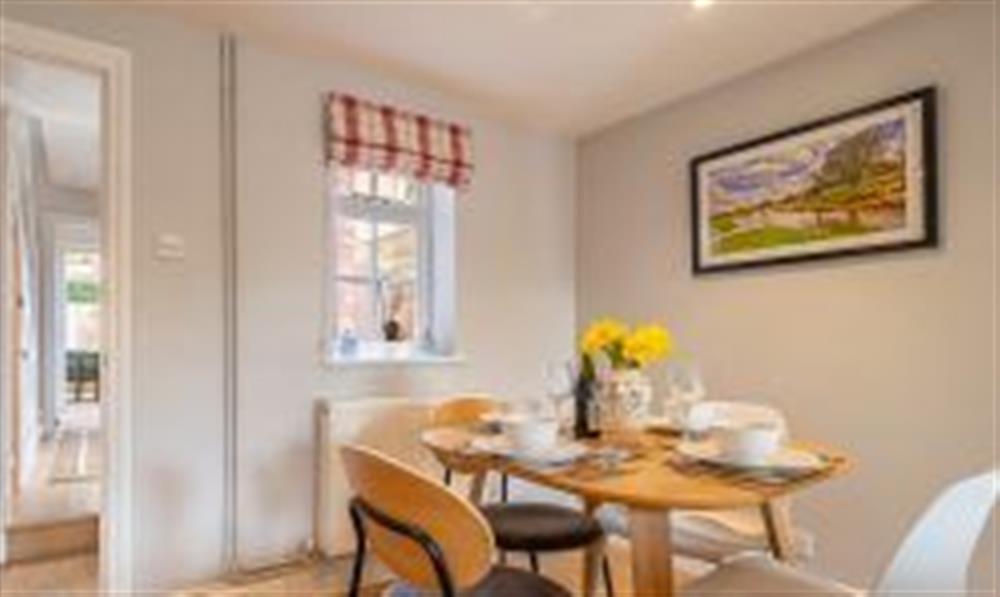 Dining room with seating with four guests at Constable Lodge, Stoke By Nayland