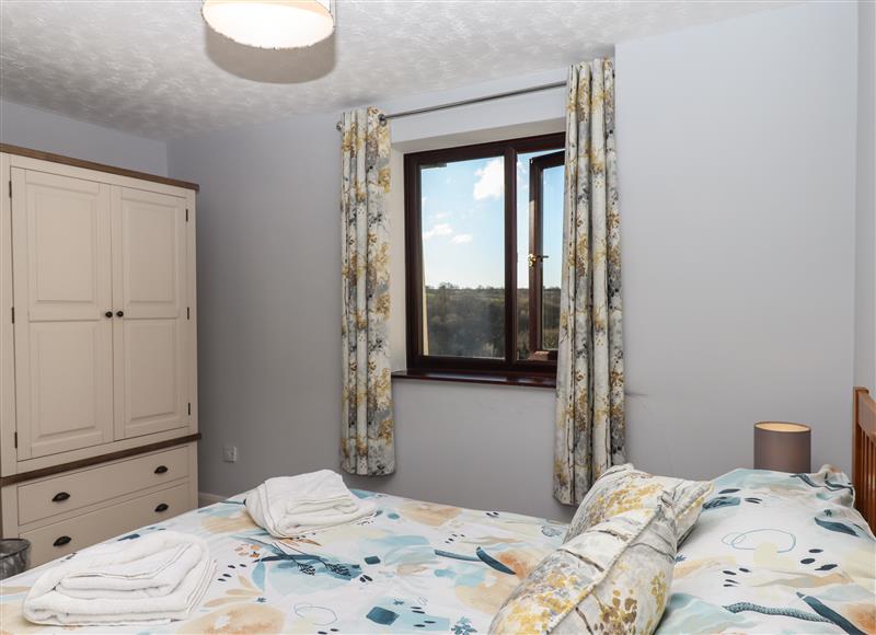 A bedroom in Coombe Cottage at Coombe Cottage, Beaples Barton