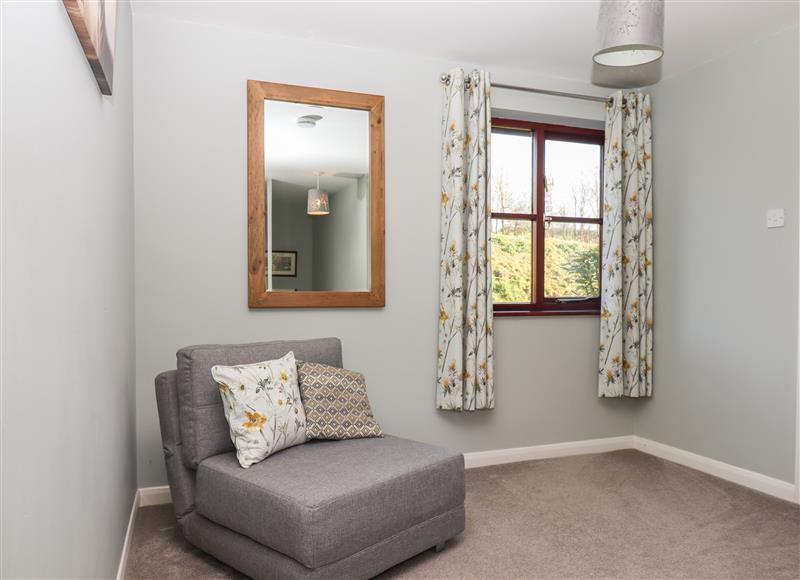 Relax in the living area at Coombe Cottage, Beaples Barton