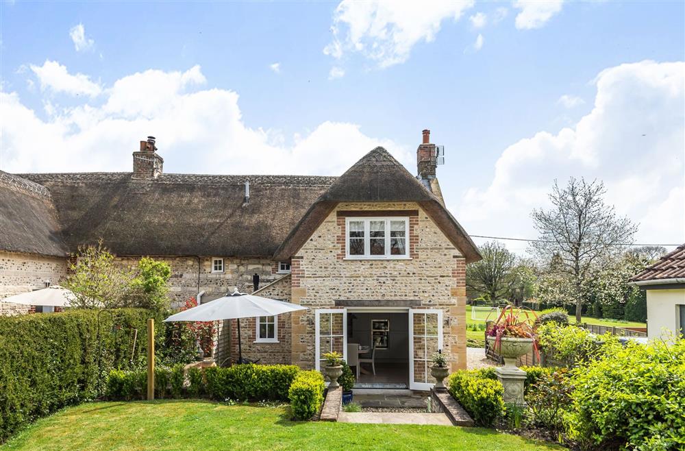 A charming Grade II listed, thatched cottage