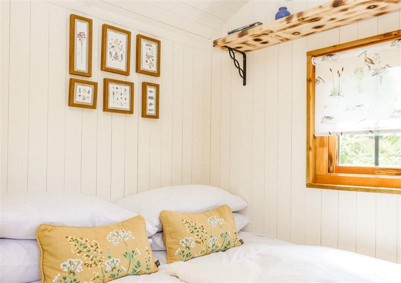 This is a bedroom at Coombe Valley Shepherds Hut, Combeinteignhead