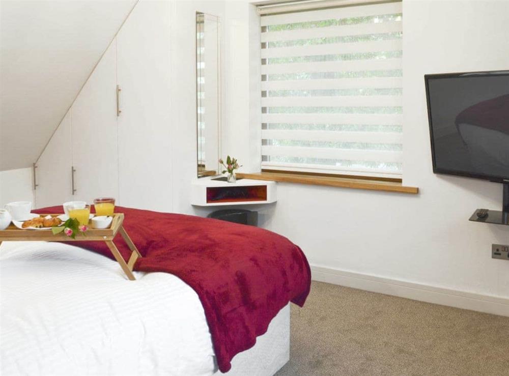 Spacious master bedroom at Coombe Wood Coach House in Hawkinge, near Folkestone, Kent