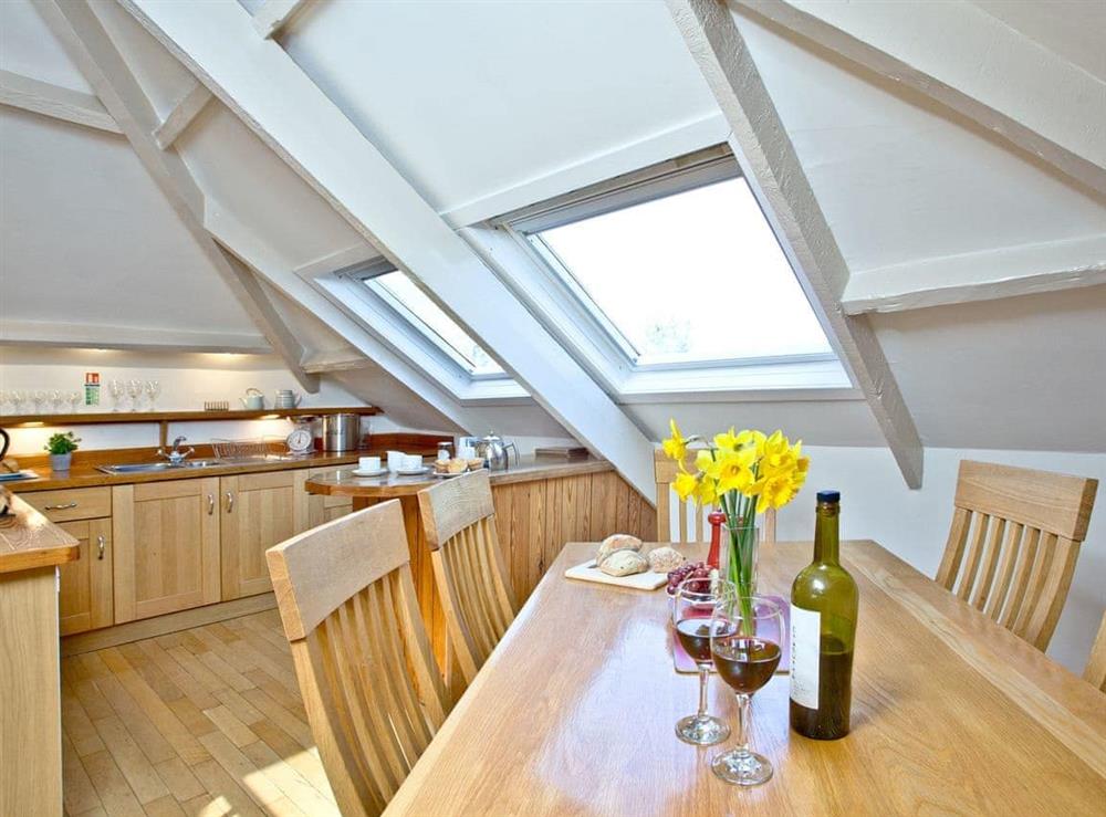 Inviting dining area at Coombery Loft in Bow Creek, Nr Totnes, South Devon., Great Britain