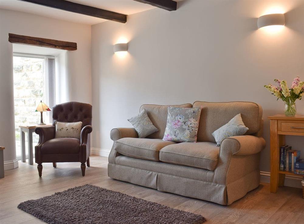 Living room at Cooper Cottage in Addingham, near Skipton, West Yorkshire