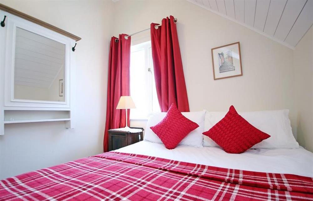 One of the bedrooms at Coot Lake House, Cotswold Lakes, Gloucestershire