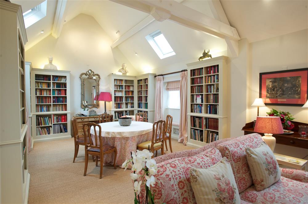 The open-plan sitting and dining room at Cope Cottage, Bruern, near Chipping Norton
