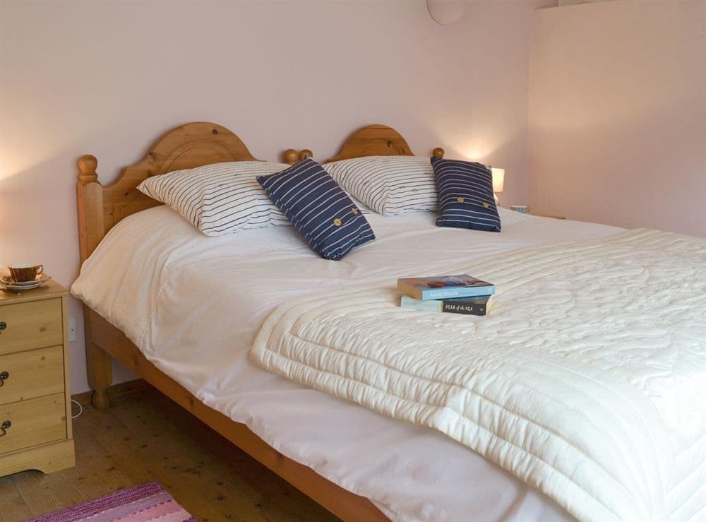 Relaxing double bedroom at Copingers Cottage in Hartland, near Bideford, Devon