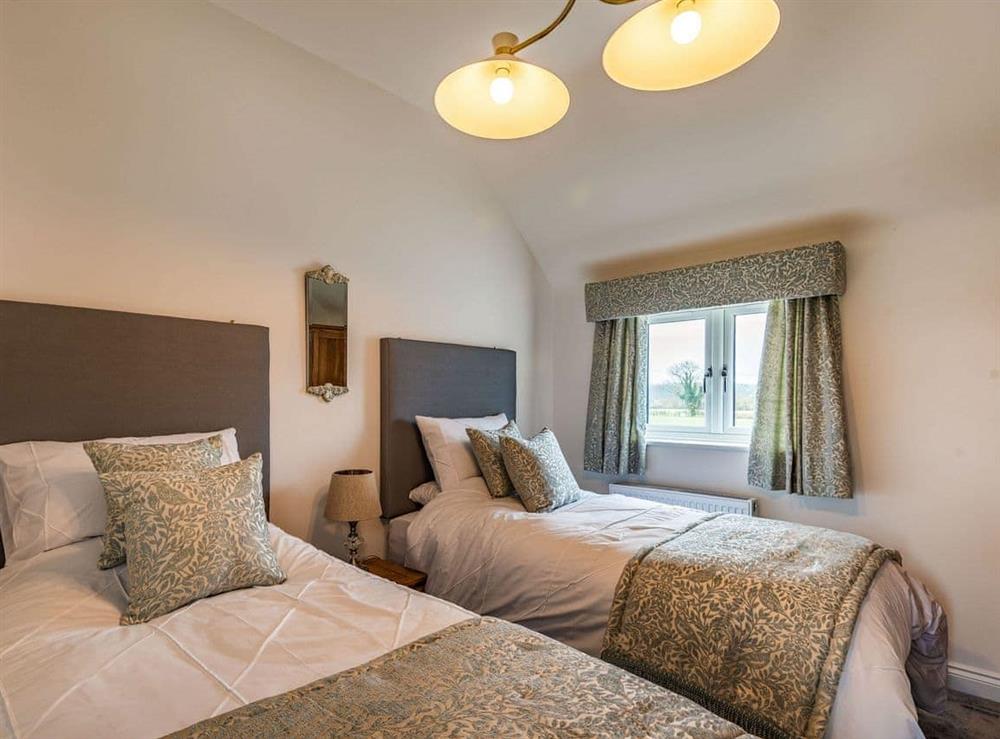 Twin bedroom at Copper Cottage in Willoughby, near Alford, Lincolnshire