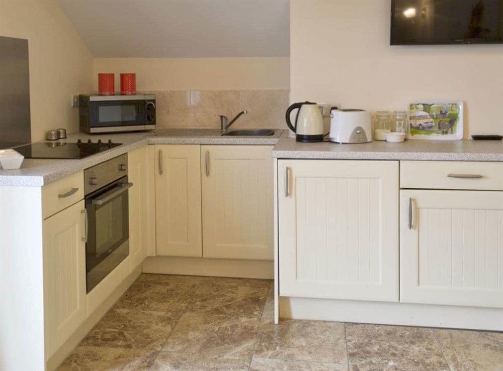 Well-equipped fitted kitchen at Hare Lodge, 