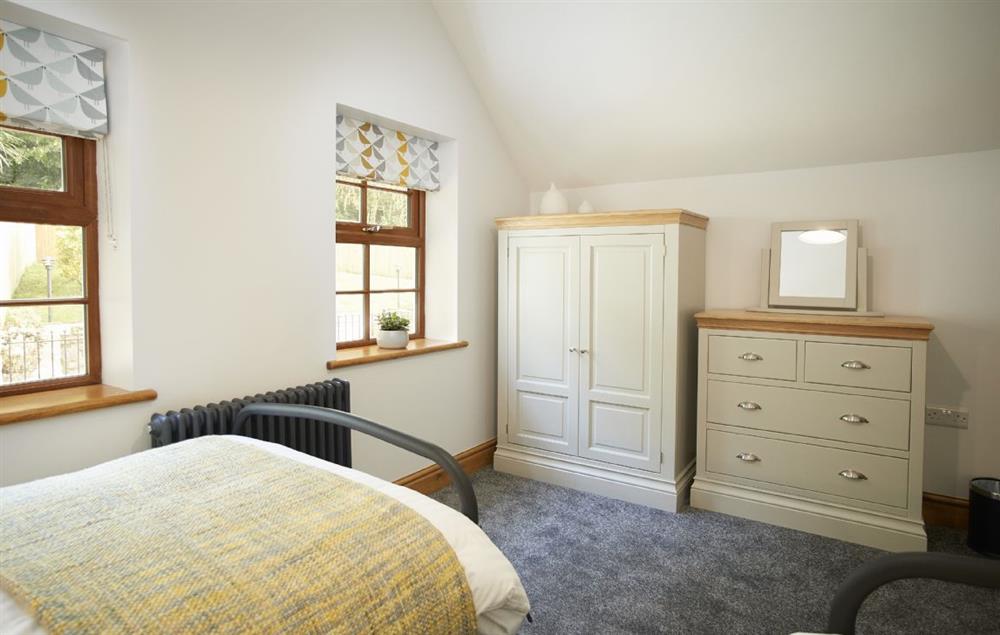 Bedroom with twin 3’ single beds and en-suite shower room (photo 2) at Coppet Hall Lodge, Saundersfoot