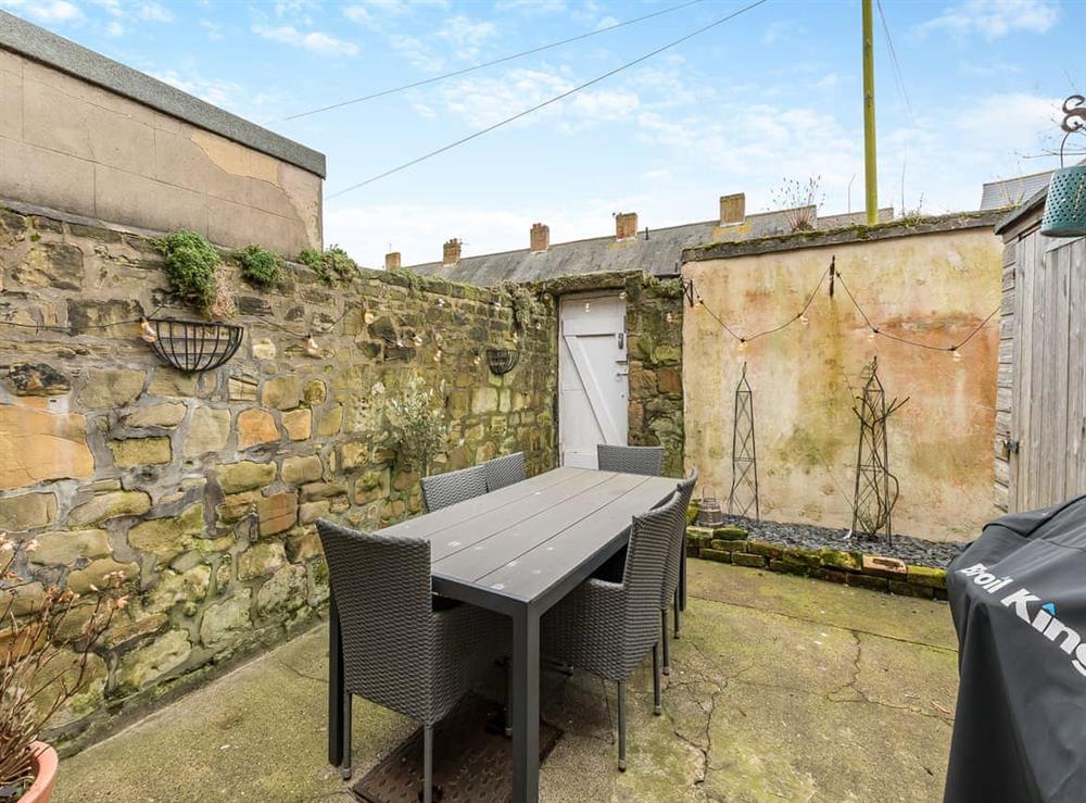 Outdoor eating area at Coral Cottage in Amble, Northumberland