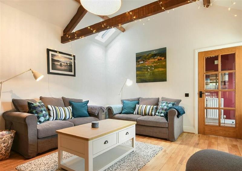 Relax in the living area at Coral Cottage, Bamburgh