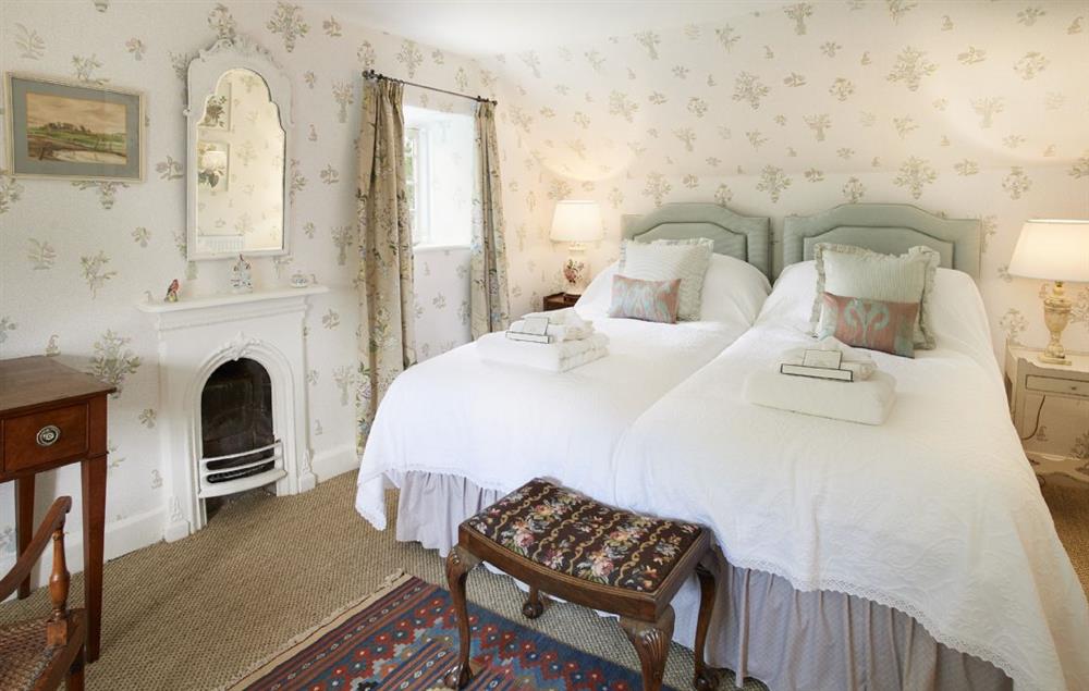 Bedroom with super king size zip and link bed, shower room at Coral Cottage, Castle Howard