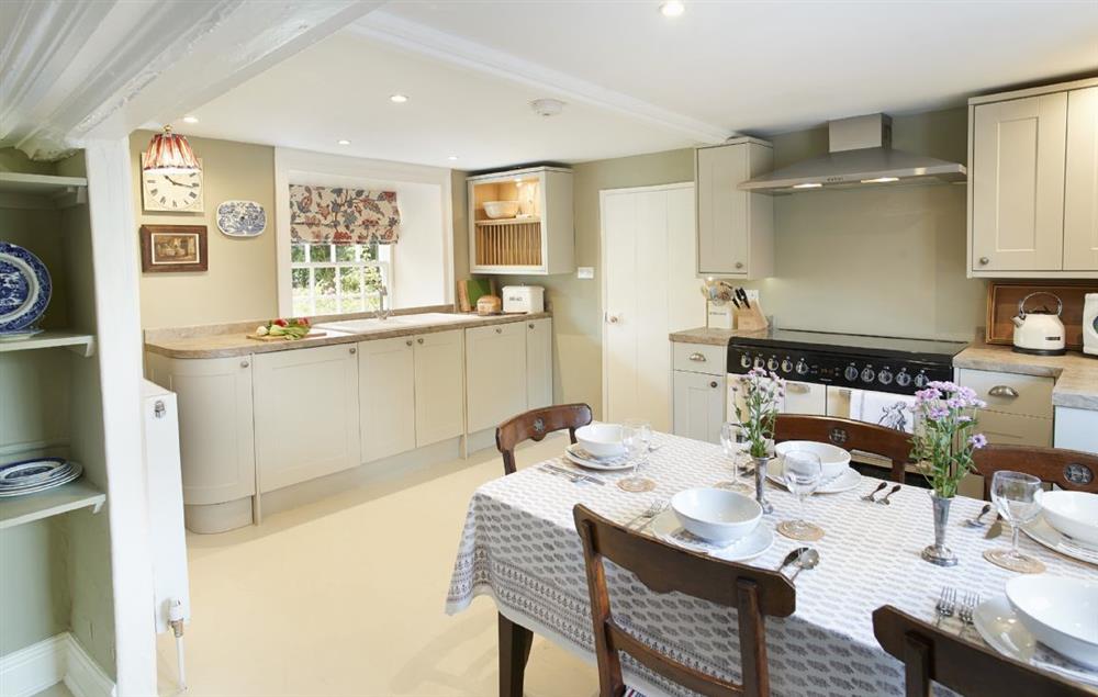 Fully equipped kitchen and breakfast room seating six guests (photo 2) at Coral Cottage, Castle Howard