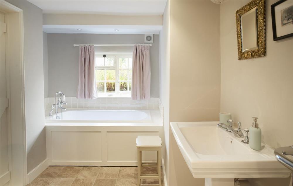 Master bedroom  en-suite bathroom with hand held shower adjustment at Coral Cottage, Castle Howard