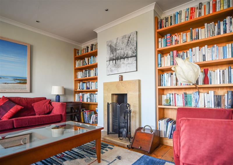 Relax in the living area at Coram Cottage, Lyme Regis