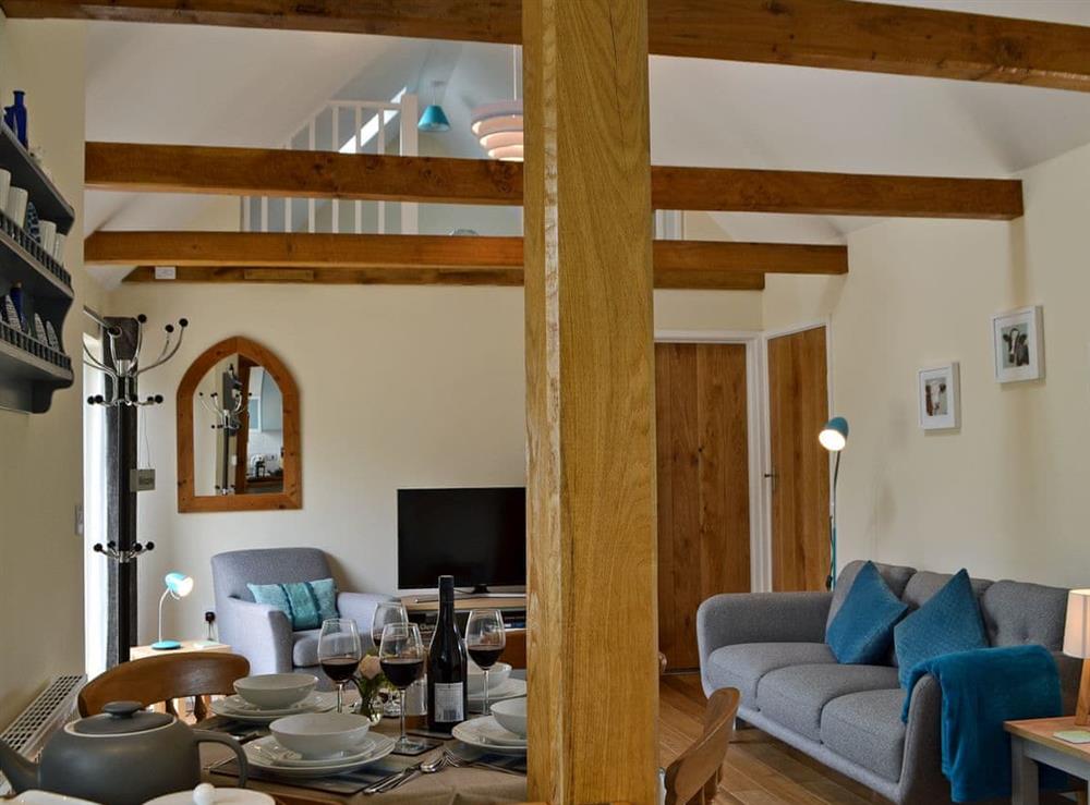 Beautifully presented open plan living space with beams at Cornbrash Farm Cottage in Earlsdown, near Heathfield, Sussex, East Sussex