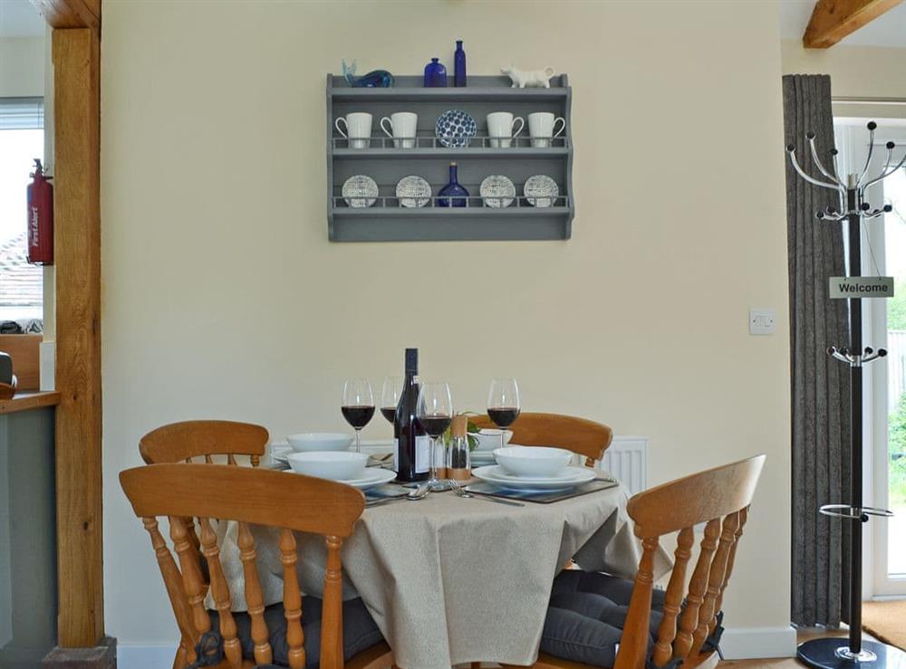 Inviting dining area at Cornbrash Farm Cottage in Earlsdown, near Heathfield, Sussex, East Sussex