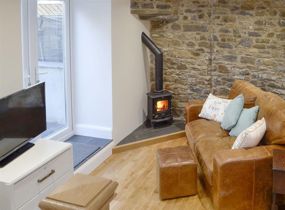 Welcoming living area at Cornel Clyd in Felinfach, near Lampeter, Ceredigion, Dyfed