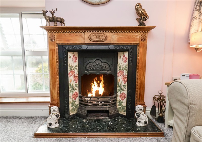 Relax in the living area at Corner Cottage, Thornton Dale