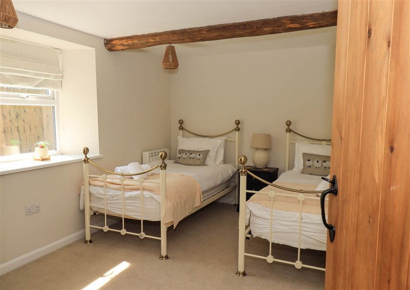 A bedroom in Corner Cottage at Corner Cottage, Unthank near Penrith