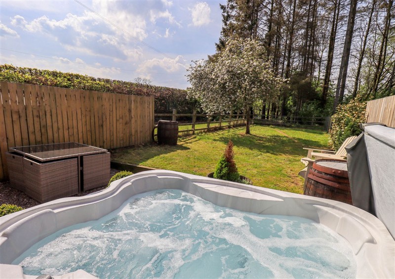 There is a hot tub (photo 2) at Corner Cottage, Unthank near Penrith