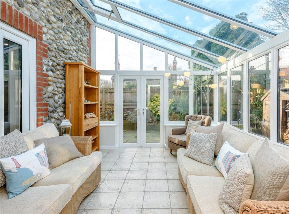 Relaxing conservatory (photo 3) at Corner House in East Runton, Norfolk