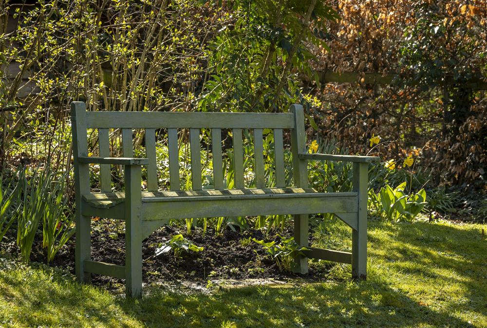 A bench for two at the top of garden at Corner Thatch, Abbots Morton
