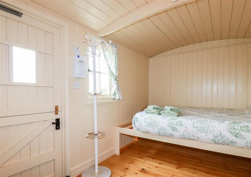 This is the bedroom at Cornerpark Shepherds Hut, Bush near Bude