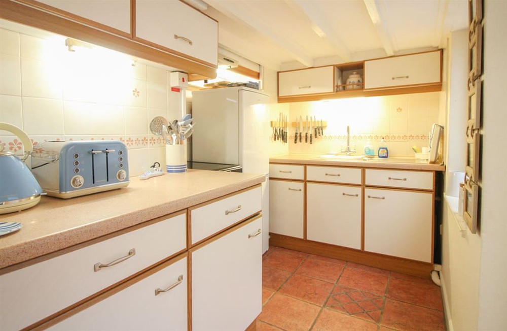 Kitchen area at Cornerstone Cottage in Mousehole, Cornwall