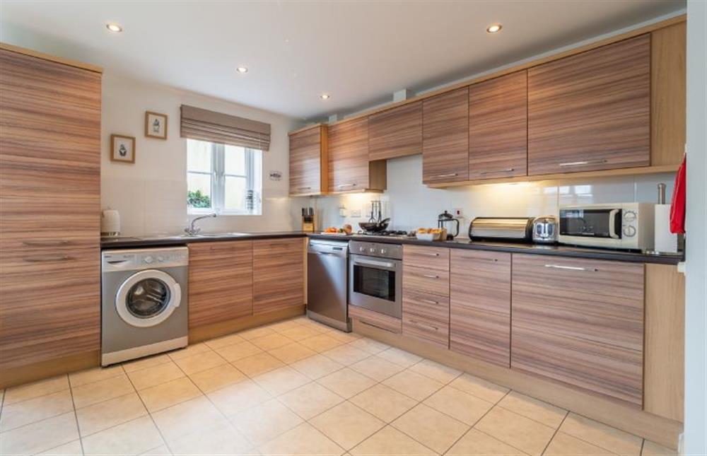 Kitchen with oven, hob, fridge, freezer, dishwasher and washing machine at Cornish Fun, Duporth