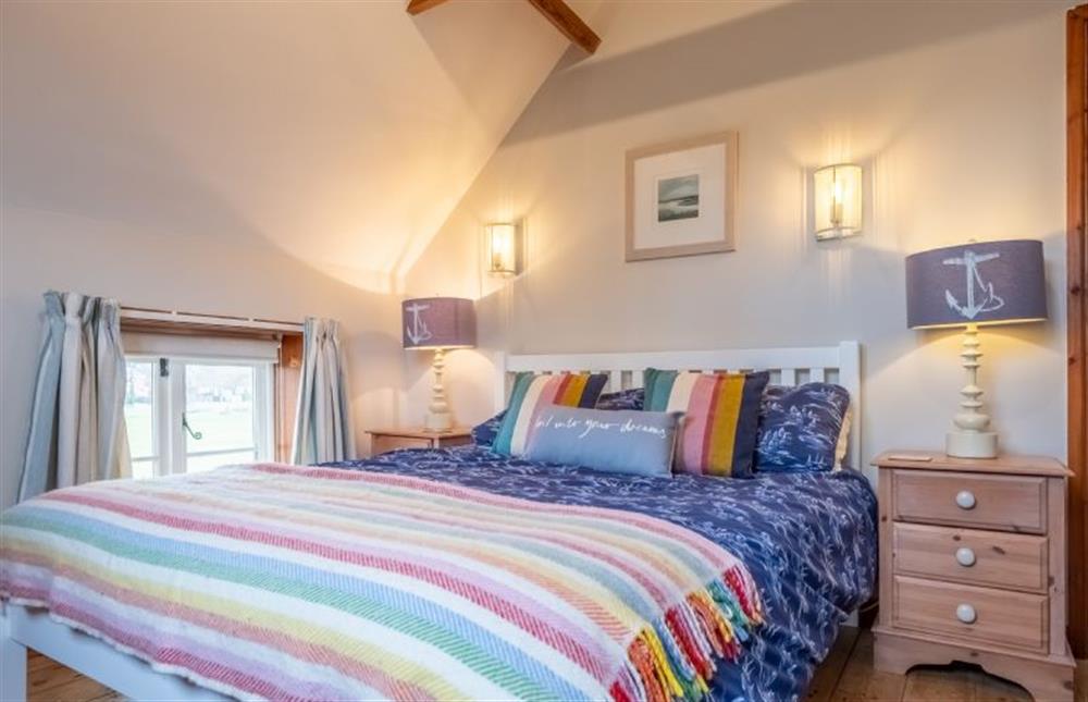Bedroom two with king-size bed at Cornloft Cottage, South Creake near Fakenham