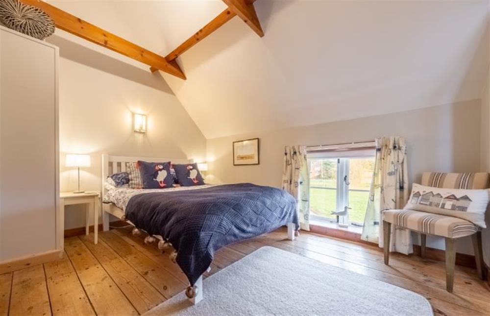 Master bedroom with double bed at Cornloft Cottage, South Creake near Fakenham