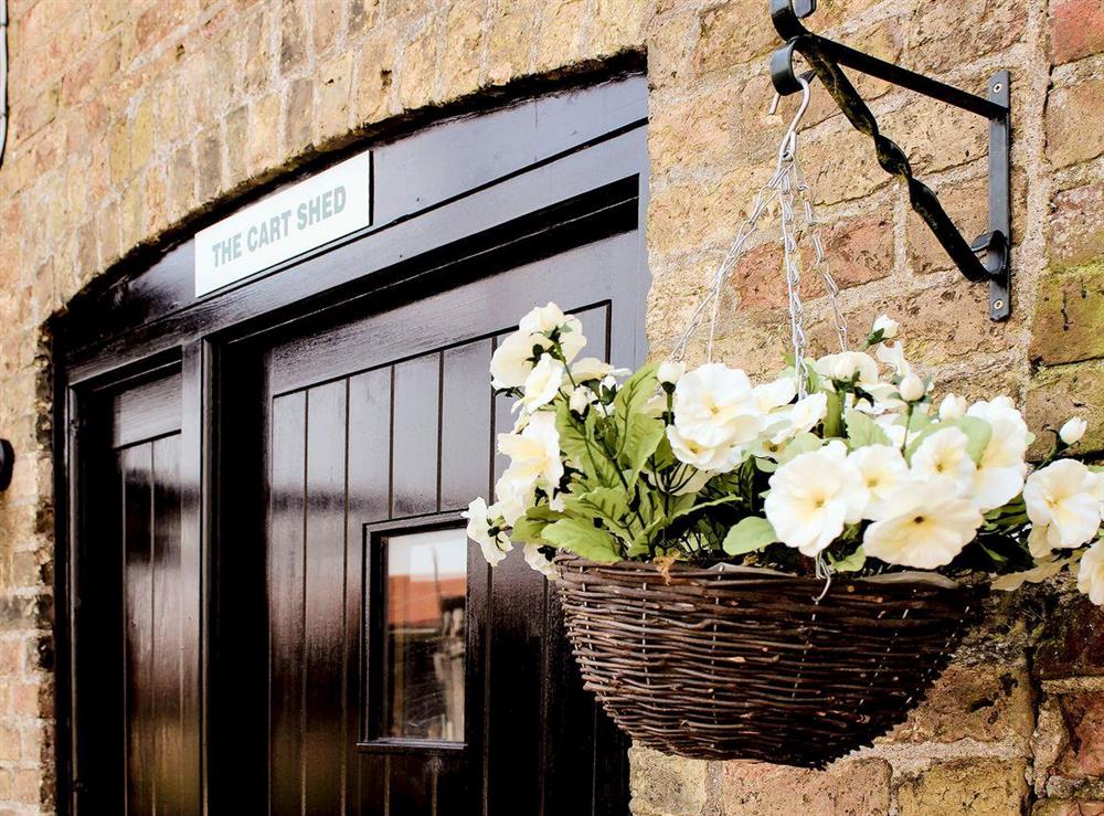 Attractive and welcoming front door at The Cart Shed, 