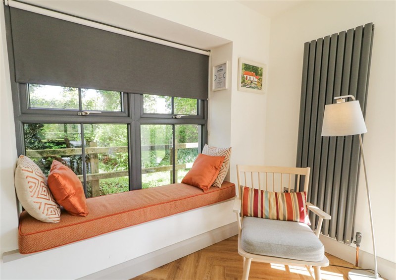 Relax in the living area (photo 2) at Corradillar Quay Cottage, Lisnaskea