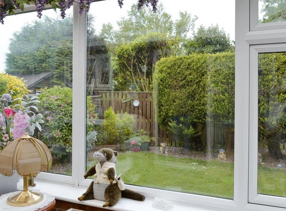 View over the garden from the conservatory at Cosy Corner in Bridlington, North Humberside