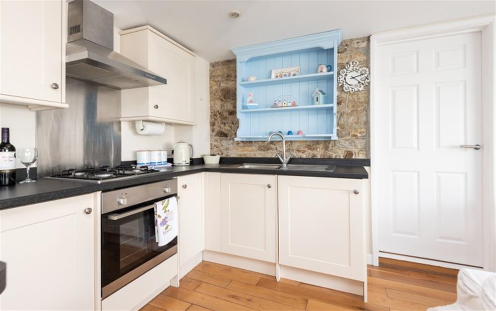 Well equipped kitchen with washer/dryer at Cosy Corner in Lyme Regis
