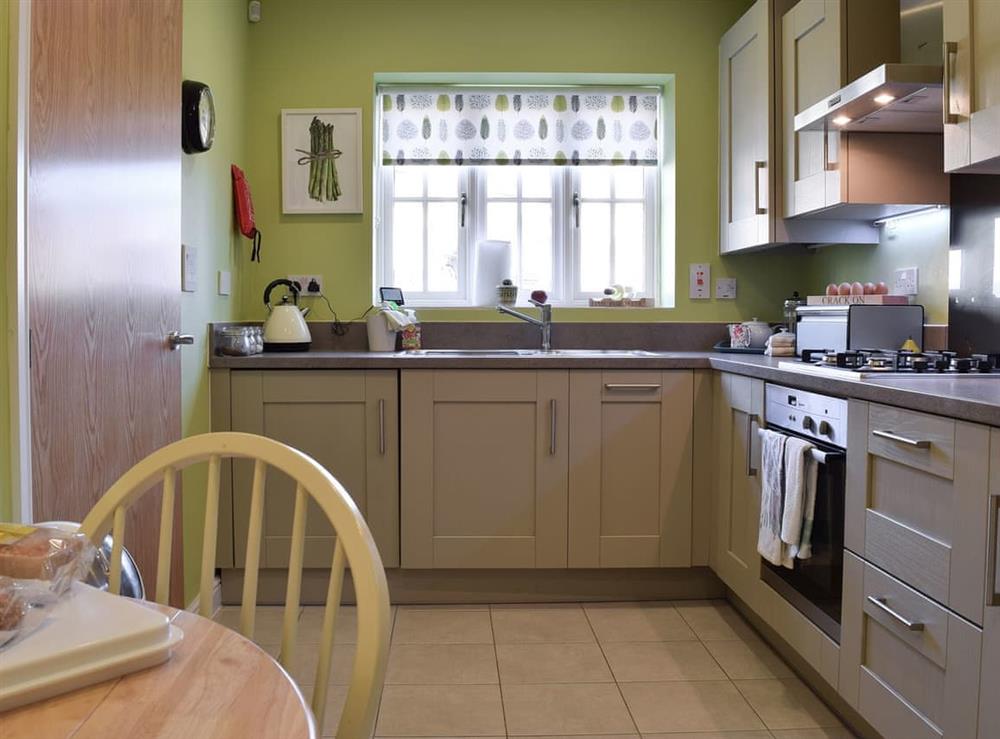 Kitchen with dining area at Cosy Cotswolds Townhouse in Shipston-on-Stour, Warwickshire