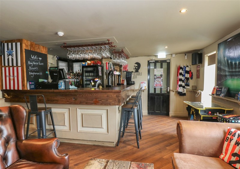 Relax in the living area at Cosy Cottage 4, Brandon