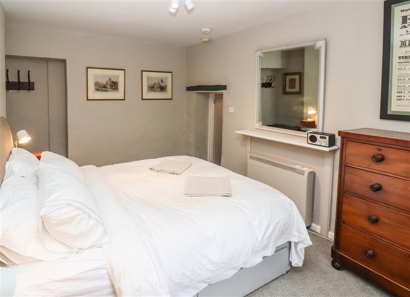 One of the bedrooms at Cosy Cottage, Burford