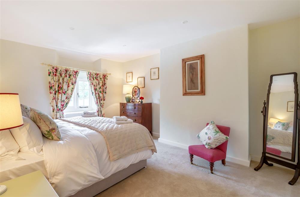 Bedroom one, located on the first floor at Cosy Cottage, Dorchester