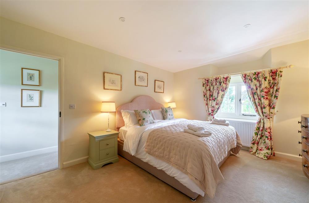 Bedroom one with plenty of space and luxurious furnishings at Cosy Cottage, Dorchester