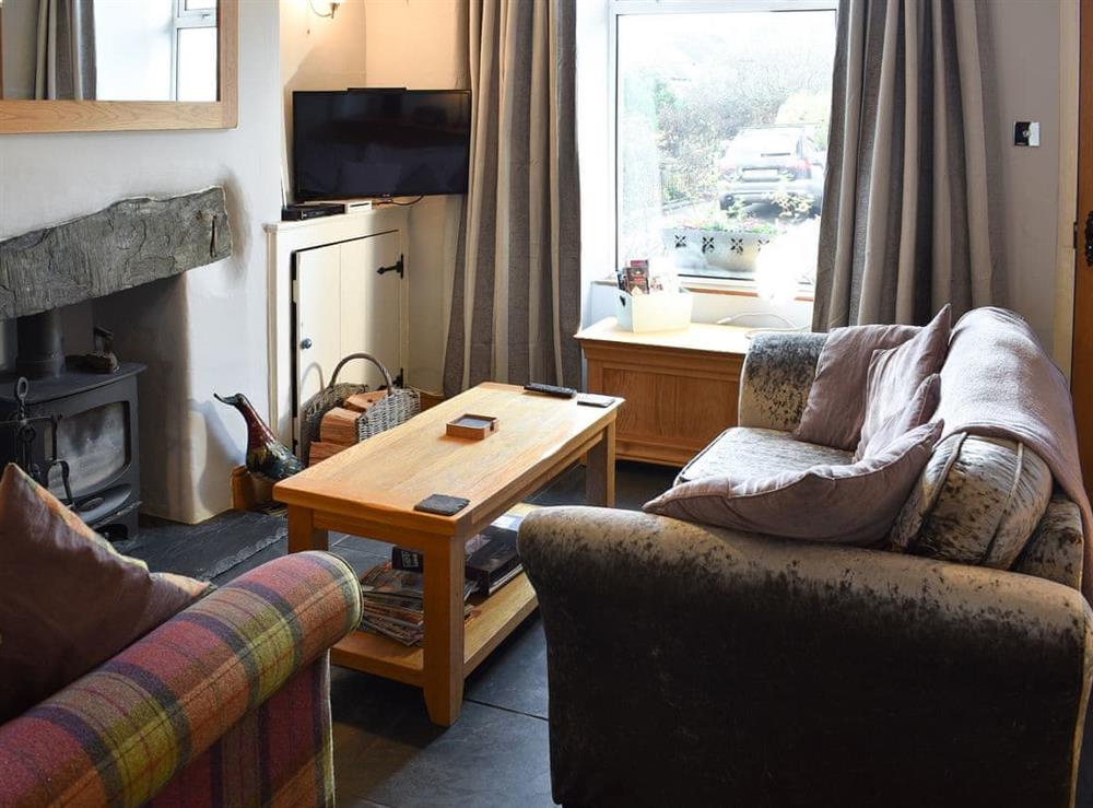 Cosy living room at Cosy Cottage in Windermere, Cumbria