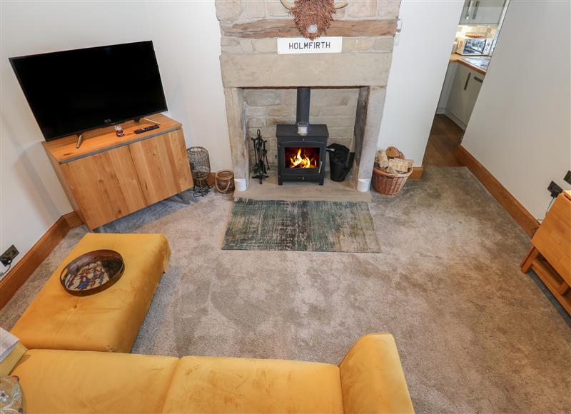 Relax in the living area at Cosy Nest Cottage, Holmfirth