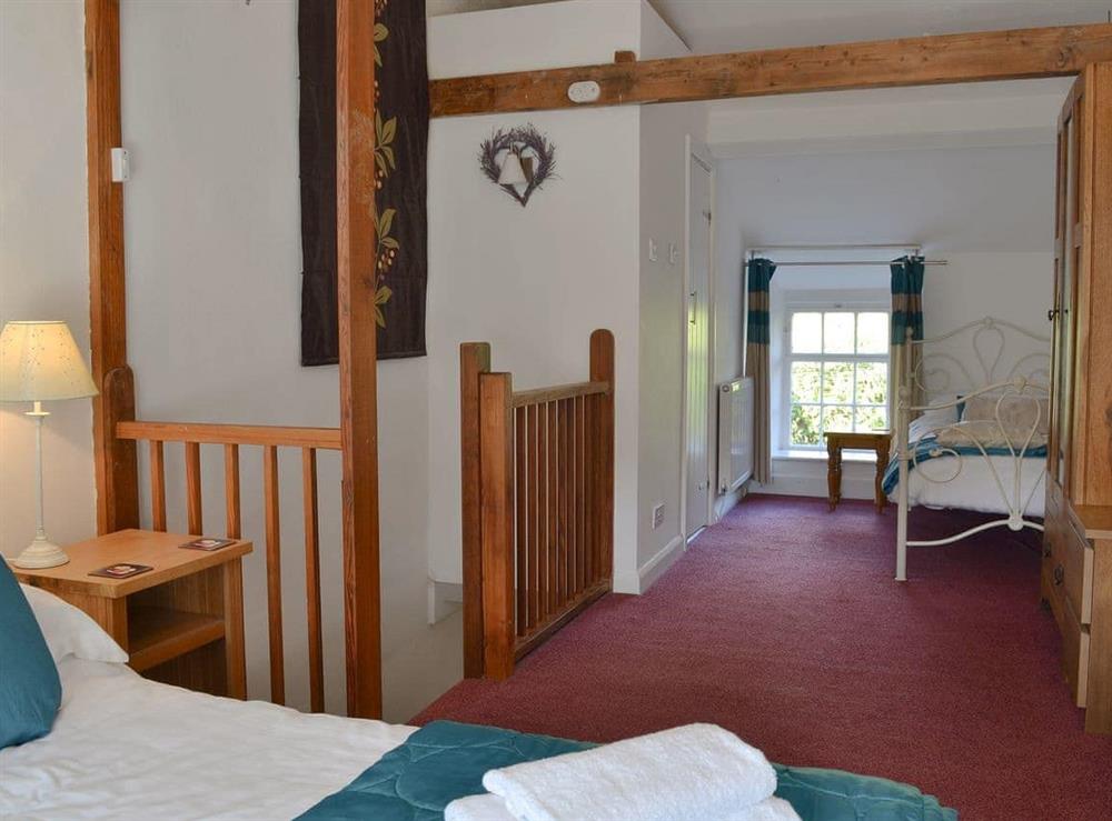Comfortable bedroom with a double and single bed (photo 2) at Cosy Nook in Ambleside, Cumbria