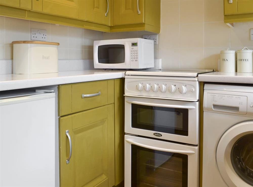 Well-equipped fitted kitchen at Cosy Nook in Cromford, near Matlock, Derbyshire, England