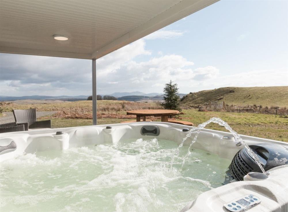 Relaxing hot tub with amazing views at Cot Cottage in Ringford, near Castle Douglas, Dumfries and Galloway, Kirkcudbrightshire
